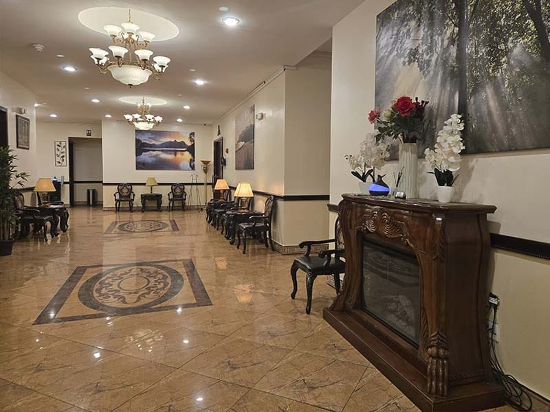 Interior of Harmony Funeral Home visitation and seating area in Brooklyn