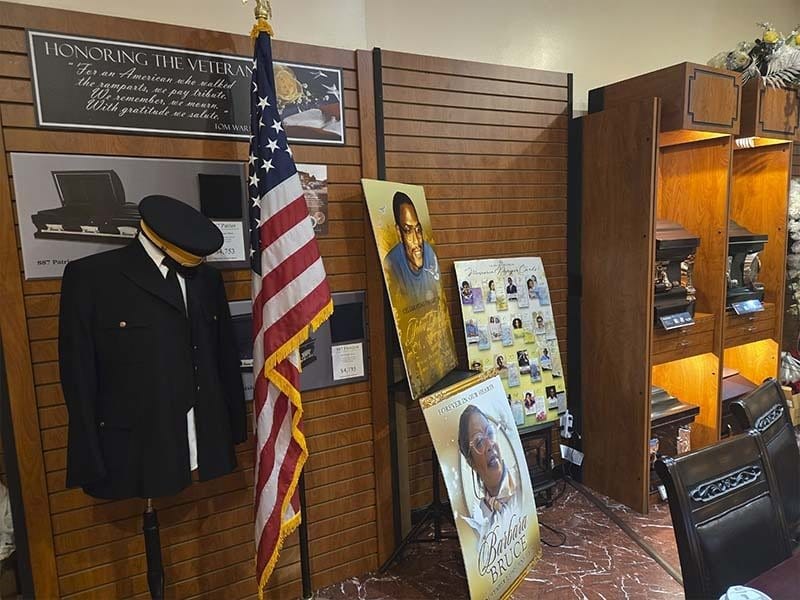 Veteran memorial display and military tribute section inside Harmony Funeral Home in Brooklyn.
