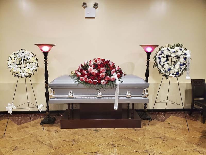 Family attending a non-religious funeral memorial service at a Brooklyn funeral home