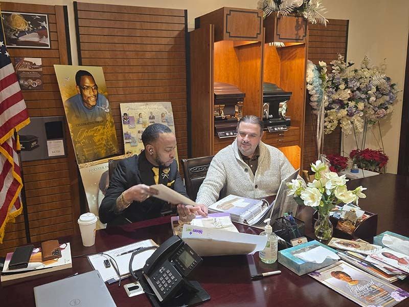 Pre-planned funeral payment options consultation at Harmony Funeral Home in Brooklyn NY