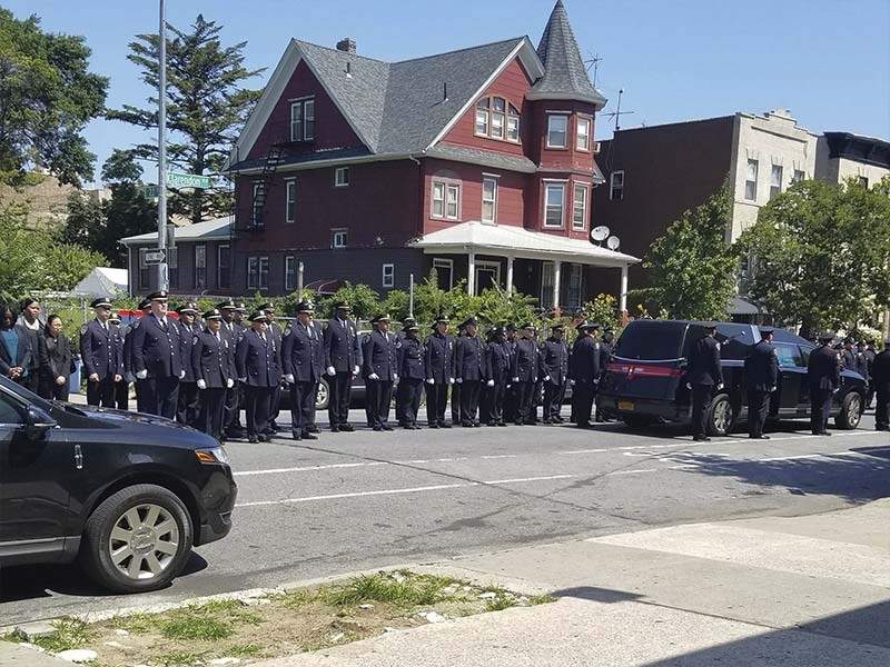 Veteran funeral honor guard ceremony arranged by Harmony Funeral Home in Brooklyn NY
