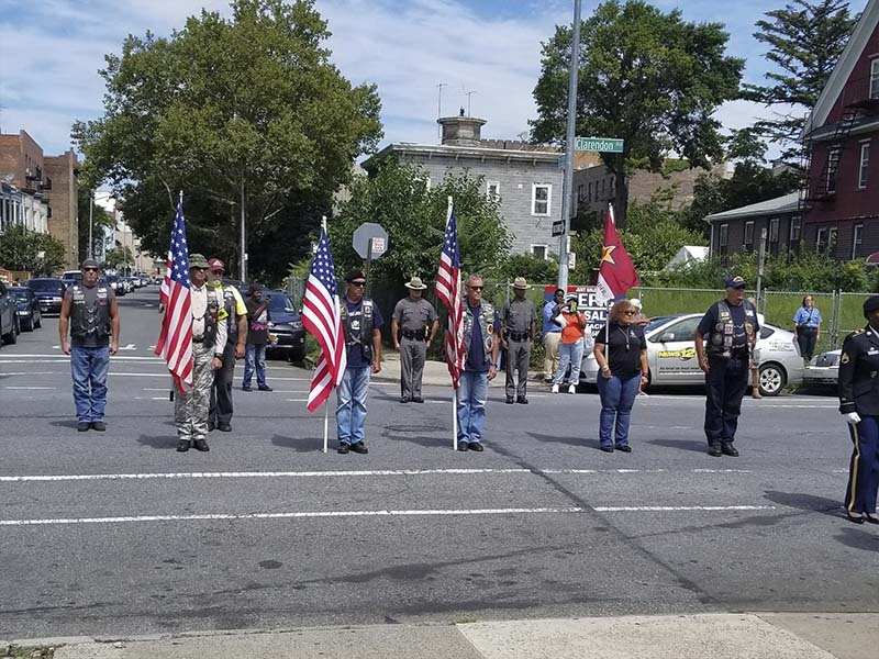 Veteran honor guard participating in a military funeral service in Brooklyn